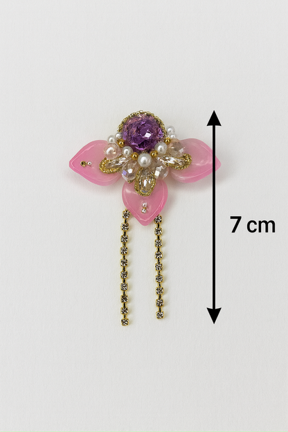 Korean statement earrings with pink petals and purple gem
