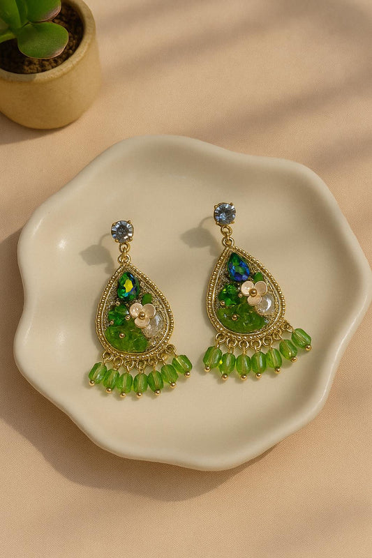Korean teardrop earrings with green crystals and floral details
